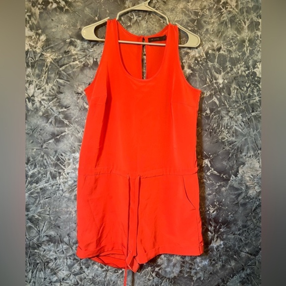 The limited red sleeveless shorts romper jumpsuit M